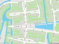 Ambulance met grote spoed naar de De Gouden Leeuw in Wormer