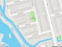 Ambulance met gepaste spoed naar de Malawistraat in Delft