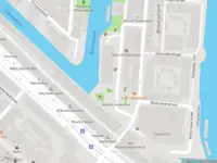 Ambulance met gepaste spoed naar de Haarlemmer Houttuinen in Amsterdam