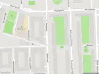 Ambulance met gepaste spoed naar de Akbarstraat in Amsterdam