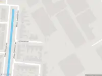 Brandweer met grote spoed naar de Pieter Sikkesstraat in Sneek vanwege gebouwbrand