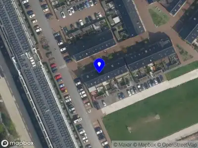 Ambulance met grote spoed naar de Van Embdenstraat in Delft