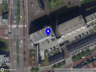 Ambulance met gepaste spoed naar de Kralendijkkade in Leiden