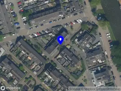 Ambulance met gepaste spoed naar de Monnickendamstraat in Zaandam