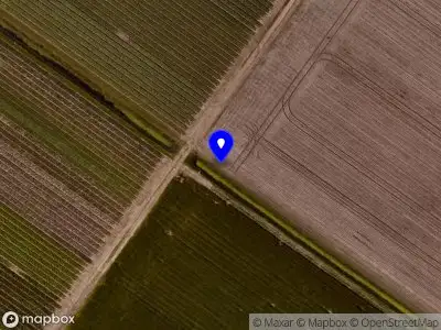 Ambulance met grote spoed naar de Postweg in De Cocksdorp