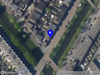 Ambulance met grote spoed naar de Kokkelsingel in 's-Gravenhage