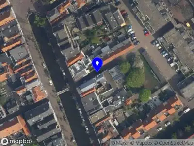Ambulance met grote spoed naar de Pieterstraat in Delft