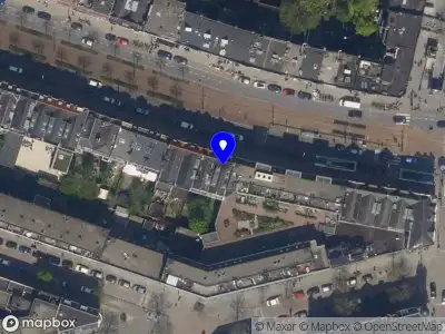 Ambulance met grote spoed naar de Schiedamseweg in Rotterdam