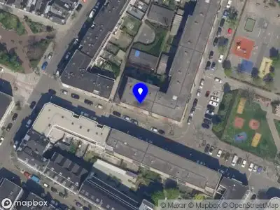 Ambulance met grote spoed naar de Woelwijkstraat in Rotterdam