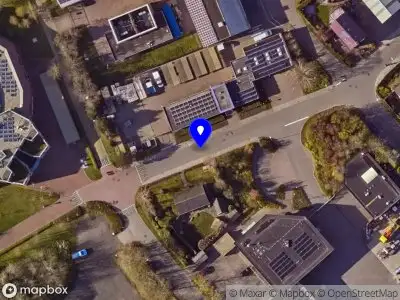 Ambulance met grote spoed naar de Slingerweg in Den Burg