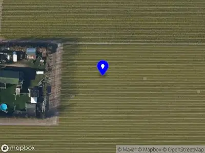 Brandweer met gepaste spoed naar de Nieuweweg in Den Helder vanwege een buitenbrand