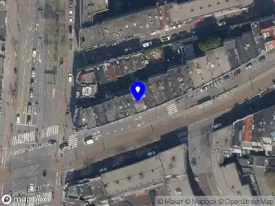 Ambulance met grote spoed naar de 1e Middellandstraat in Rotterdam