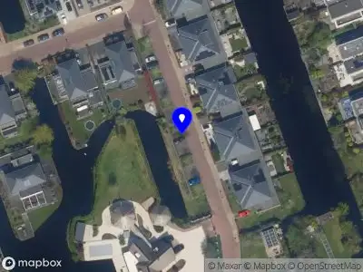 Ambulance met grote spoed naar de Wegelingpark in Capelle aan den IJssel