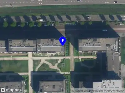 Brandweer met grote spoed naar de Titus van Rijnstraat in Amsterdam vanwege reanimatie