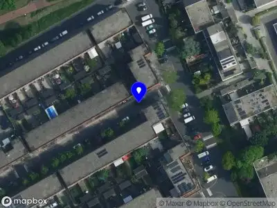 Ambulance met grote spoed naar de Kousenbandstraat in Amsterdam