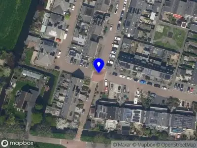 Ambulance met grote spoed naar de Rederij van Holststraat in Krimpen aan de Lek