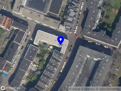 Ambulance met grote spoed naar de Woelwijkstraat in Rotterdam