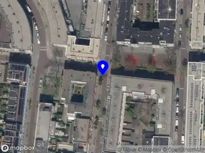 Ambulance met grote spoed naar de Kogelvangerstraat in Rotterdam