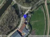 Ambulance met grote spoed naar de Breekade in Spijkenisse