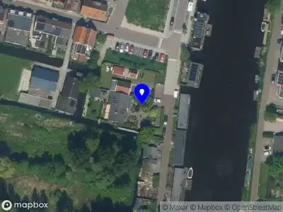 Ambulance met grote spoed naar de Zuidervaartdijk in Krommenie