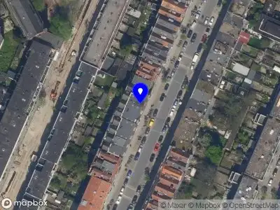Ambulance met grote spoed naar de Grote Visserijstraat in Rotterdam