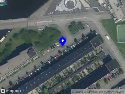 Ambulance met gepaste spoed naar de Justpier in Zaandam