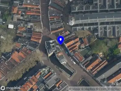 Ambulance met gepaste spoed naar de Dubbele Buurt in Gouda