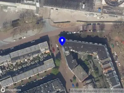 Ambulance met grote spoed naar de Tolhuisstraat in Rotterdam