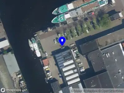 Ambulance met gepaste spoed naar de Conradkade in Haarlem