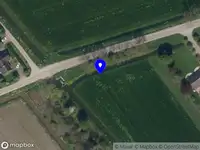 Ambulance en brandweer met gepaste spoed naar de Oude Hoevenseweg in Tricht