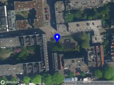 Ambulance met gepaste spoed naar de Taandwarsstraat in Amsterdam