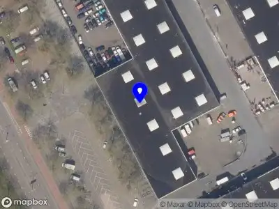 Ambulance met grote spoed naar de Olympiaweg in Rotterdam