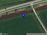 Politie met grote spoed naar de Oosterdijk in Hindeloopen vanwege voertuigen te water