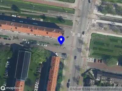 Ambulance met gepaste spoed naar de Nicolaas Ruychaverstraat in Amsterdam