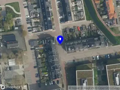 Ambulance met grote spoed naar de Schooltuinen in Gouda