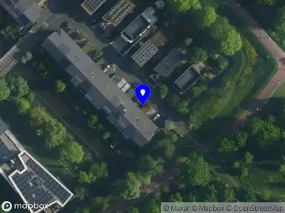 Ambulance met gepaste spoed naar de Voorlandpad in Amsterdam