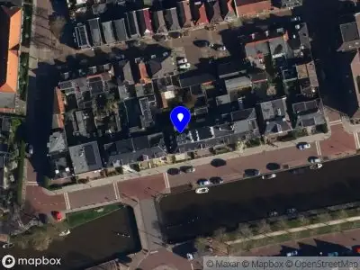 Brandweer met grote spoed naar de Looxmagracht in Sneek vanwege gebouwbrand