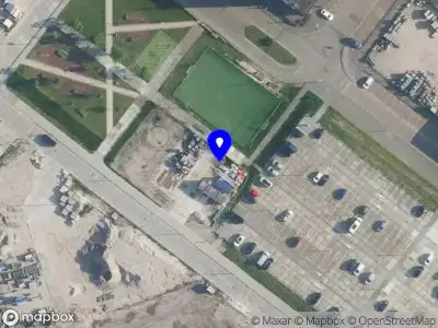 Ambulance met grote spoed naar de Kraanspoor in Amsterdam