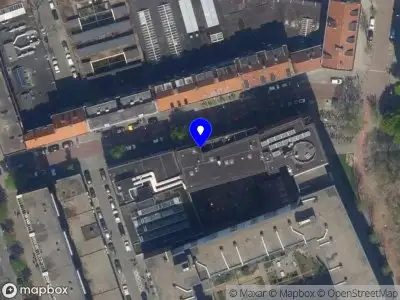 Ambulance met gepaste spoed naar de Bredestraat in Rotterdam