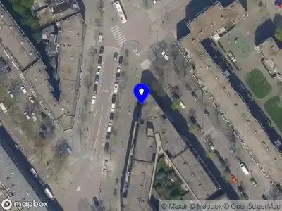 Ambulance met grote spoed naar de Damstraat in Rotterdam