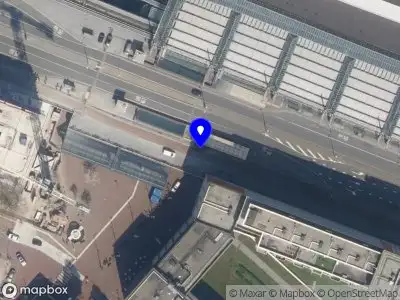 Ambulance met grote spoed naar de Stationsplein in Schiedam