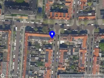 Brandweer met grote spoed naar de Dirk van Wassenaarstraat in Schiedam vanwege afhijsen patient