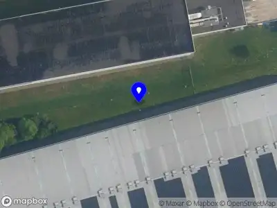 Ambulance met gepaste spoed naar de Kopraweg in Amsterdam