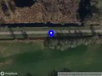 Ambulance met grote spoed naar de Woelwijk in Leeuwarden vanwege voertuigbrand