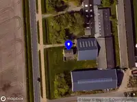 Ambulance met gepaste spoed naar de Nieuwlanderweg in Den Burg