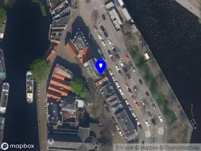 Ambulance met grote spoed naar de Havenstraat in Rotterdam