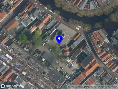 Ambulance met gepaste spoed naar de Komijnsteeg in Gouda