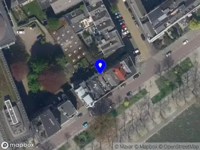 Ambulance met grote spoed naar de Westerkade in Rotterdam