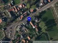 Brandweer en politie met grote spoed naar de Stationswei in Molkwerum vanwege middelgrote brand