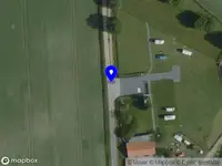 Ambulance met grote spoed naar de Schepengraaf in Ospel